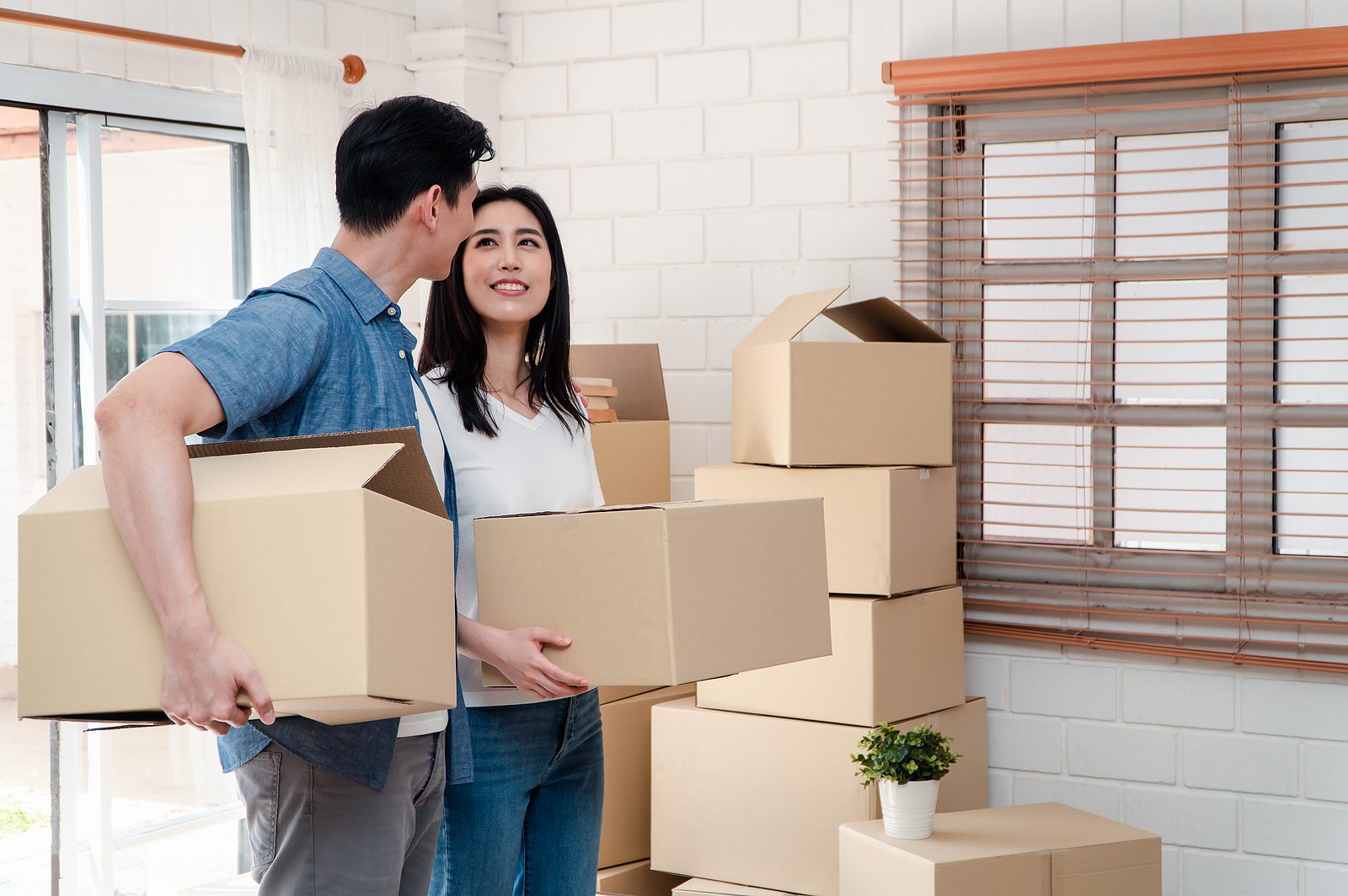 Will the new tiers affect my house sale? 2 bigstock happy young couple carrying ca 380221708