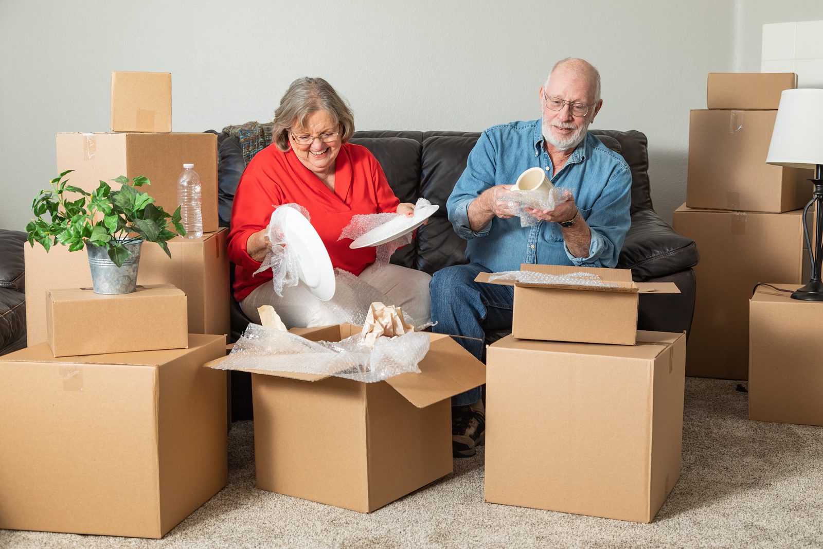 Downsizing your property: A comprehensive guide by webuyanyhouse.co.uk 6 bigstock senior adult couple packing or 2617028474
